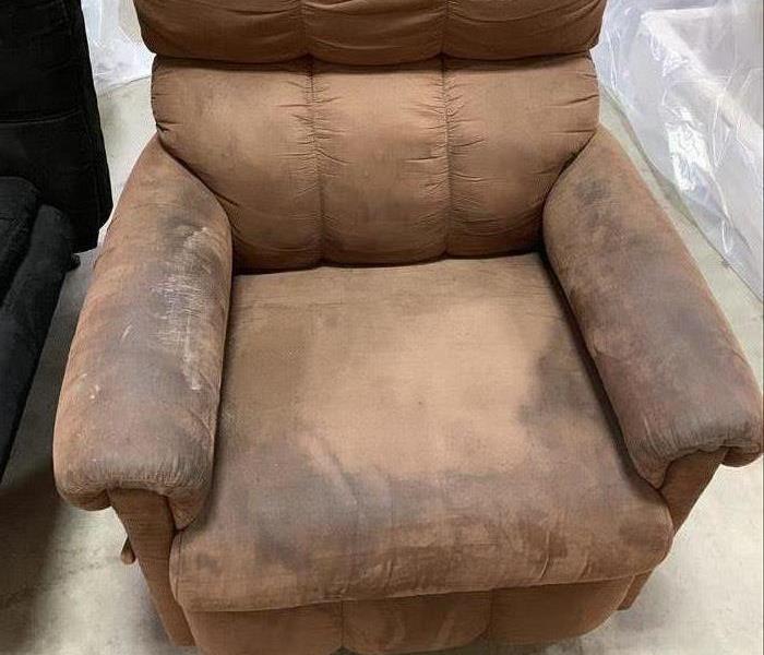 Brown Recliner with brown stains on arms and middle 