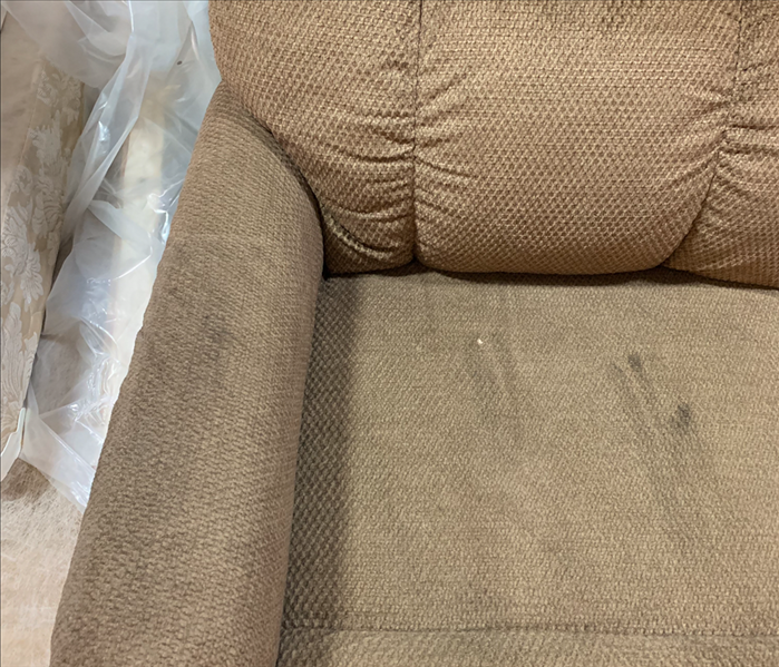 Recliner with smoke marks on it