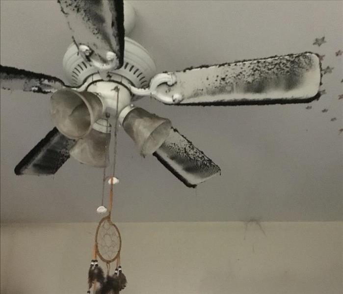 Smoke Covered Ceiling fan 
